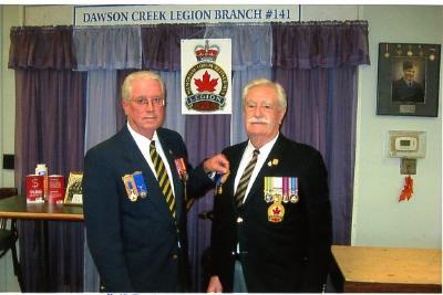 Royal Canadian Legion, Branch # 141, Peter Batchelor presenting 50 year pin to David Ward.  
Dawson Creek, B.C., 
2013 