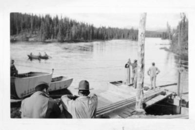 5 unidentified military personnel building a temporary bridge, Alaska Highway 1941-1944